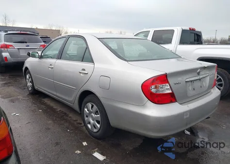 2003 Toyota Camry Le from USA, damaged, VIN 4T1BE32K73U231819